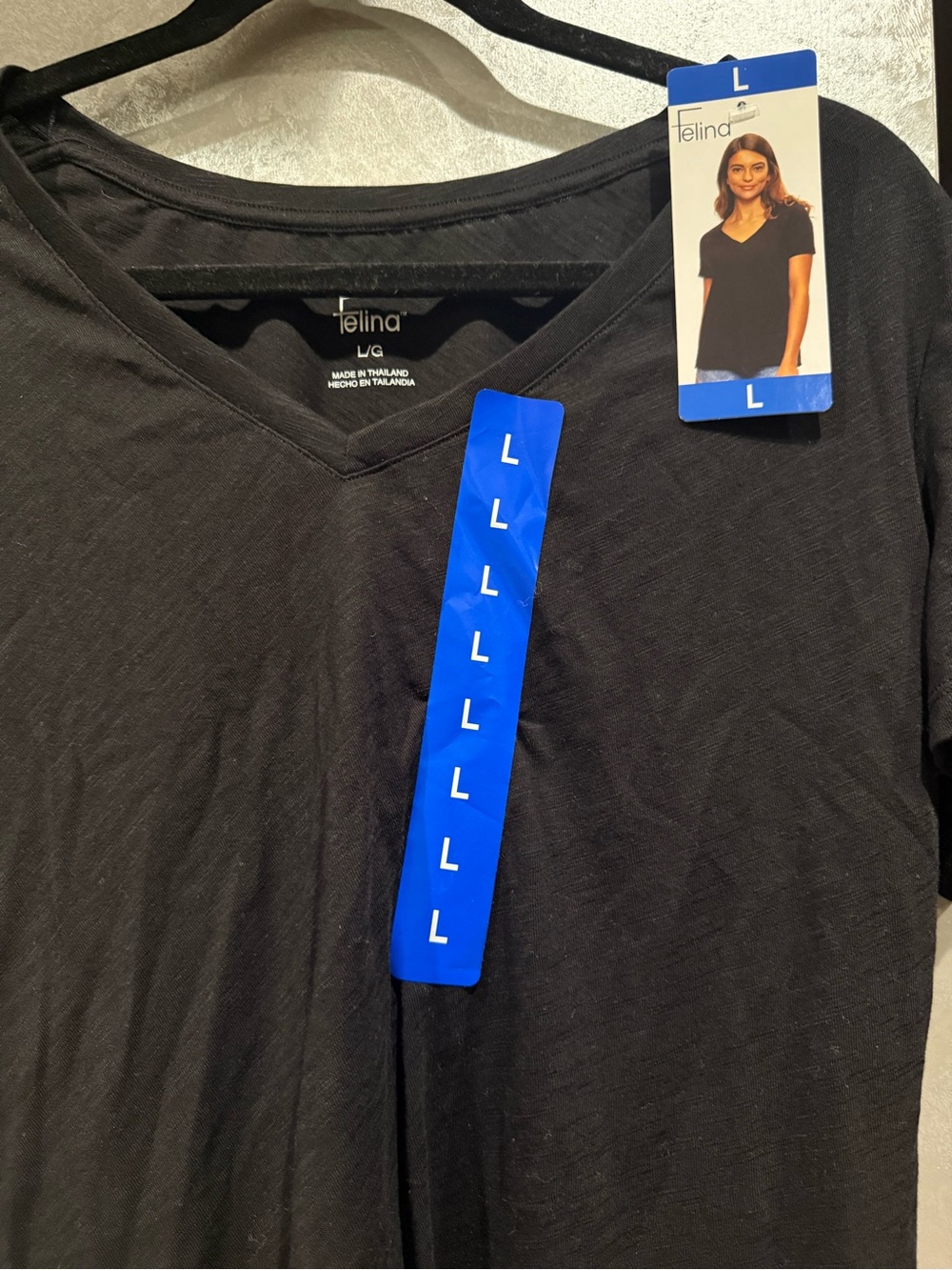 Felina Black V‑Neck Tee with Blue Size Sticker